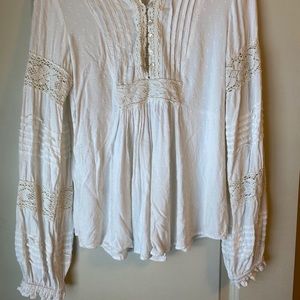 Lace detailed top with puffy sleeves